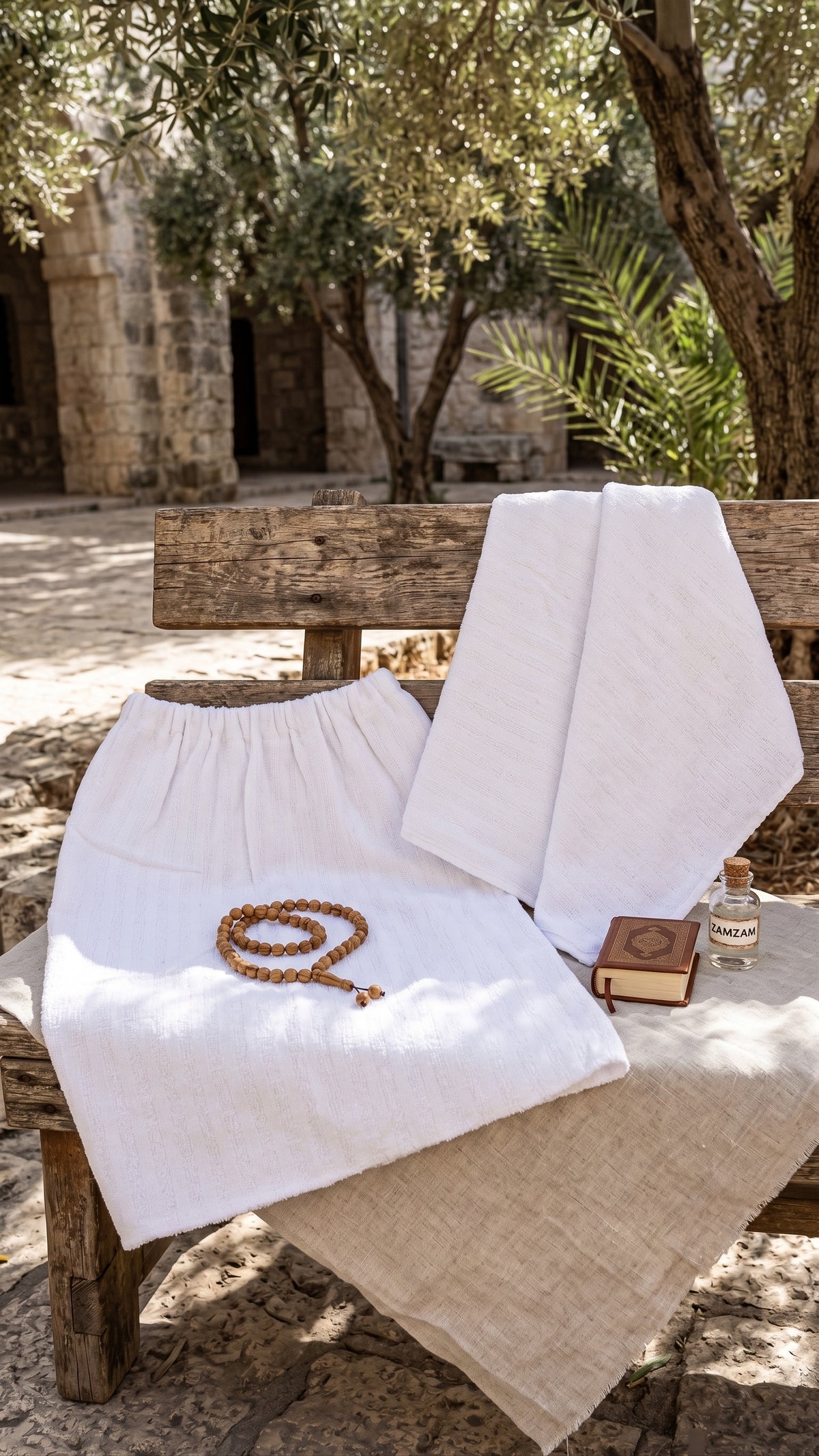Kids white Ahram Ihram set displayed outdoors